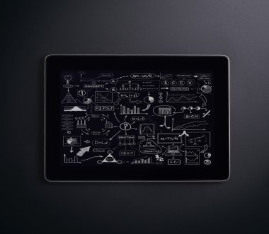 A tablet pc over the black background clipart