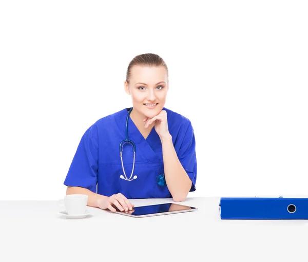 Female doctor working in office — Stock Photo, Image
