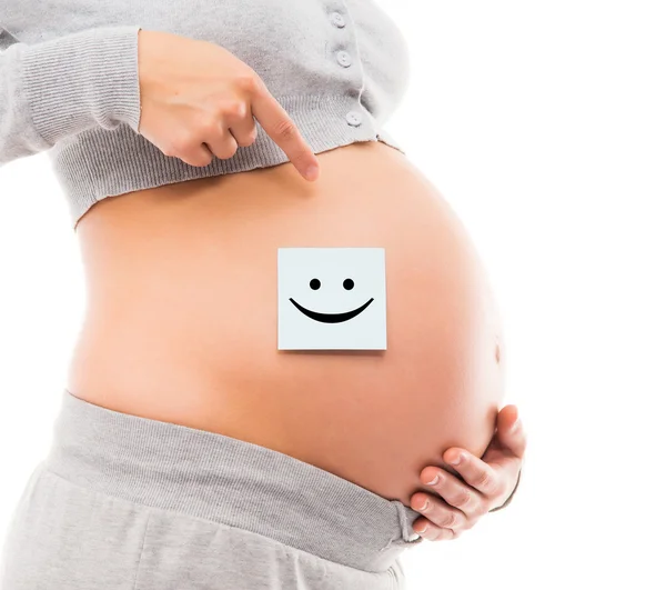 Burta unei tinere gravide — Fotografie, imagine de stoc