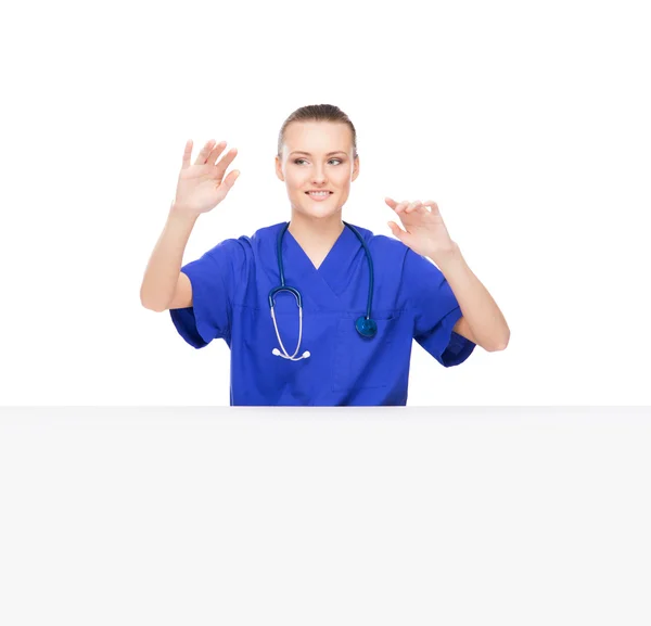 Doctor woman pushing an imaginary button — Stock Photo, Image