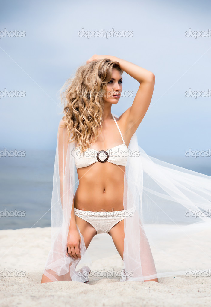 Blond woman  on beach