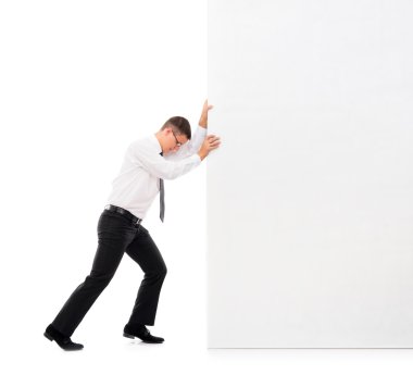 Business man pushing a big blank banner clipart