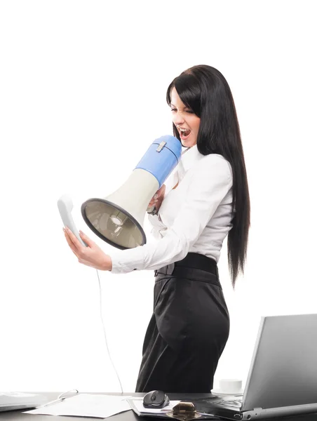 Angry business woman screaming in megaphone — Stock Photo, Image