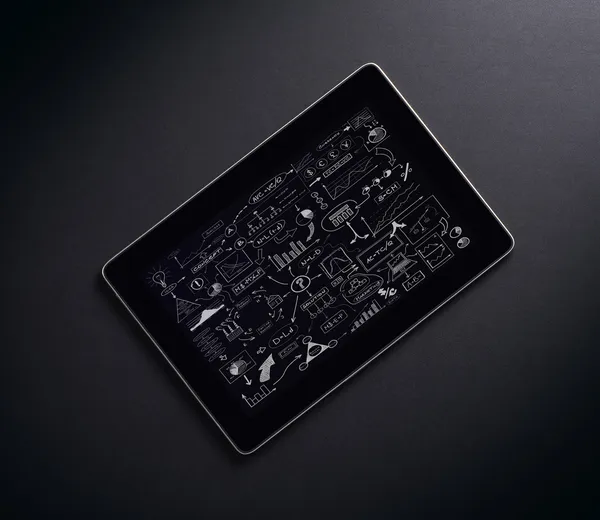 Tablet pc over the black background — Stock Photo, Image