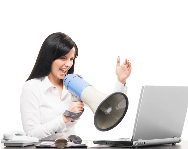 Злий бізнес-леді кричить з мегафоном — стокове фото