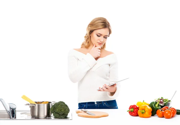 Housewife woman cooking in kitchen — Stock Photo, Image