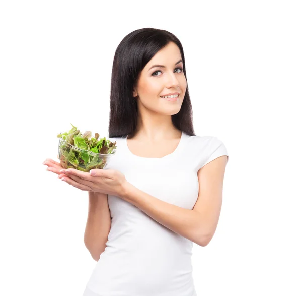 Tienermeisje met kom salade — Stockfoto