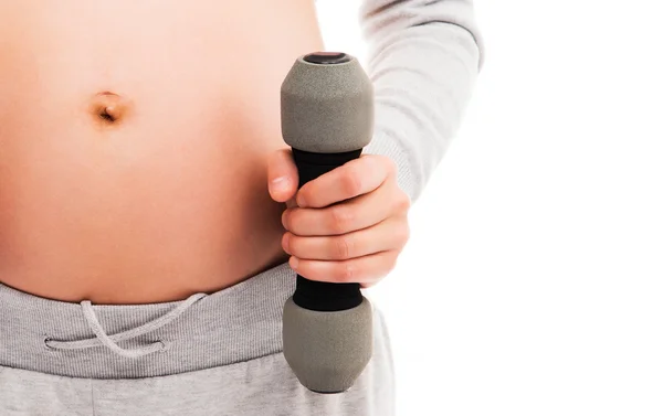 Pregnant woman with dumbbells — Stock Photo, Image