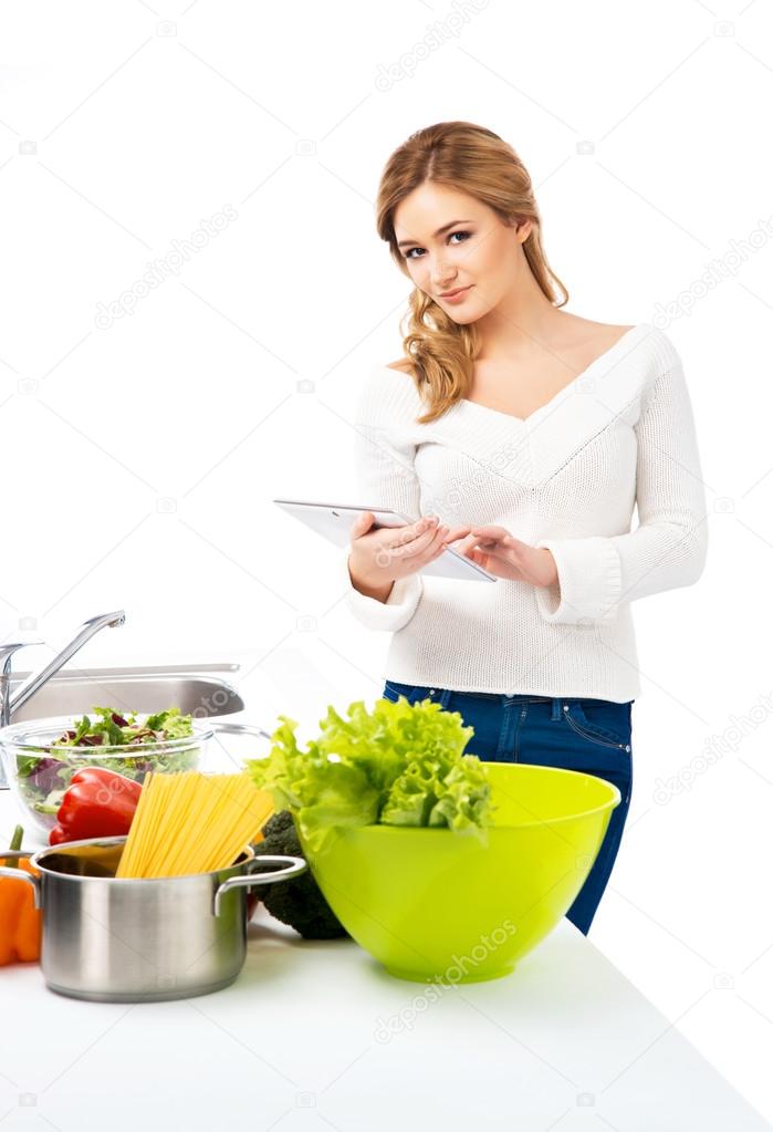 Housewife woman cooking in kitchen