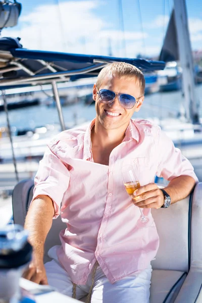 Handsome man on luxury yacht — Stock Photo, Image