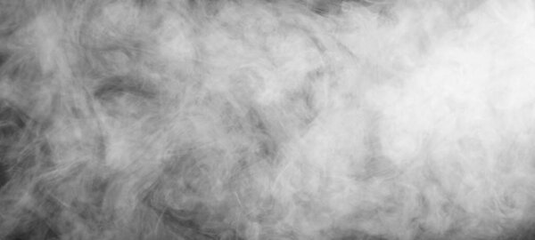 Smoke over black background. Fog or steam texture.