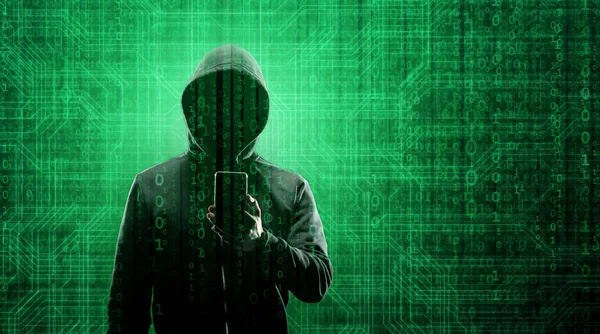 Un pirate informatique à capuche. Visage obscur et sombre. Attaque de pirate informatique, logiciels infectés par des virus, Dark Web et concept de cybersécurité . — Photo