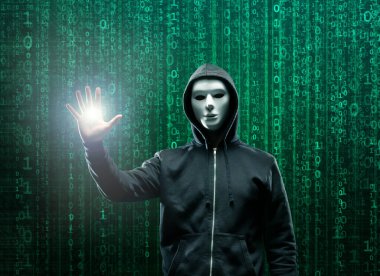 Kapüşonlu Bilgisayar Korsanı. Karanlık Surat. Hacker saldırısı, Virüs bulaşmış yazılım, Dark Web ve Siber Güvenlik kavramı.