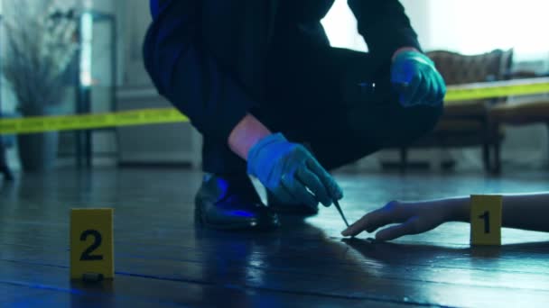Detective Collecting Evidence in a Crime Scene. Forensic Specialists Making Expertise at Home of a Dead Person. Homicide Investigation by Police Officer. — Video