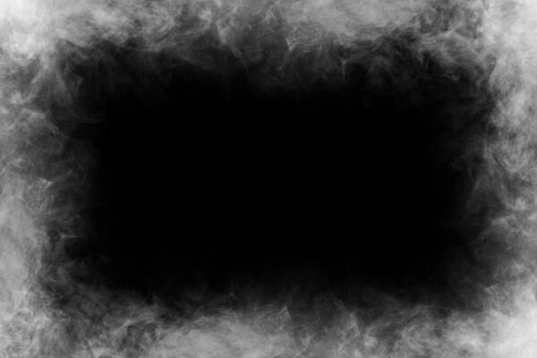 Абстрактная текстура дыма на темном черном фоне. Туман в темноте. Естественный шаблон.