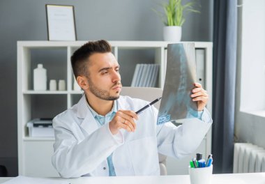 Doctor Works in the Medical Office. Workplace of a Professional Therapist in a Hospital or Clinic. Healthcare and Medicine Concept.