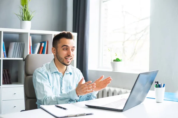 Young Man Works While Sitting Front Computer Home Workplace Professional — Φωτογραφία Αρχείου