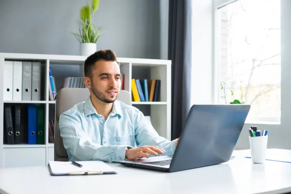 Young Man Works While Sitting Front Computer Home Workplace Professional — Stock fotografie