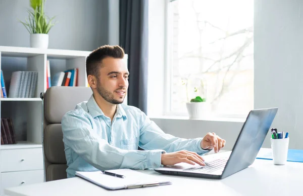 Young Man Works While Sitting Front Computer Home Workplace Professional — Stock fotografie