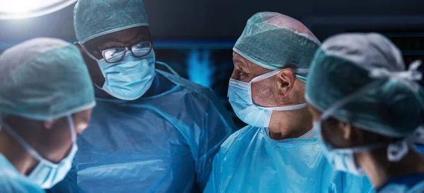 Diverse Team Professional Medical Surgeons Perform Surgery Operating Room Using — Stok fotoğraf