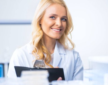 Professional Worker of a Modern Futuristic Laboratory Makes Experiments and Does Scientific Research. The Concept of Science and Modern Technology.