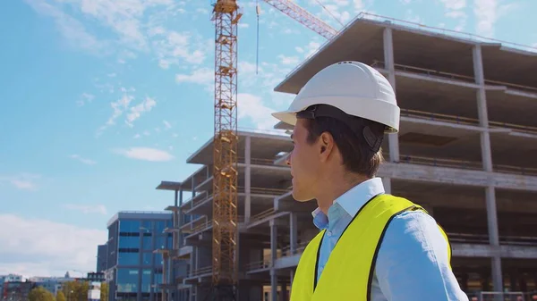 Professional Builder Standing Front Construction Site Foreman Hardhat Helmet Vest — Stock Photo, Image