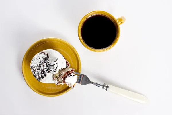 Tasty dessert on the round plate with cup of coffe — Stock Photo, Image