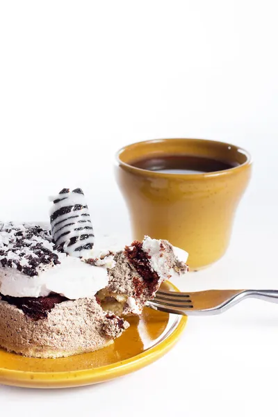 Tasty dessert on the round plate with cup of coffe — Stock Photo, Image