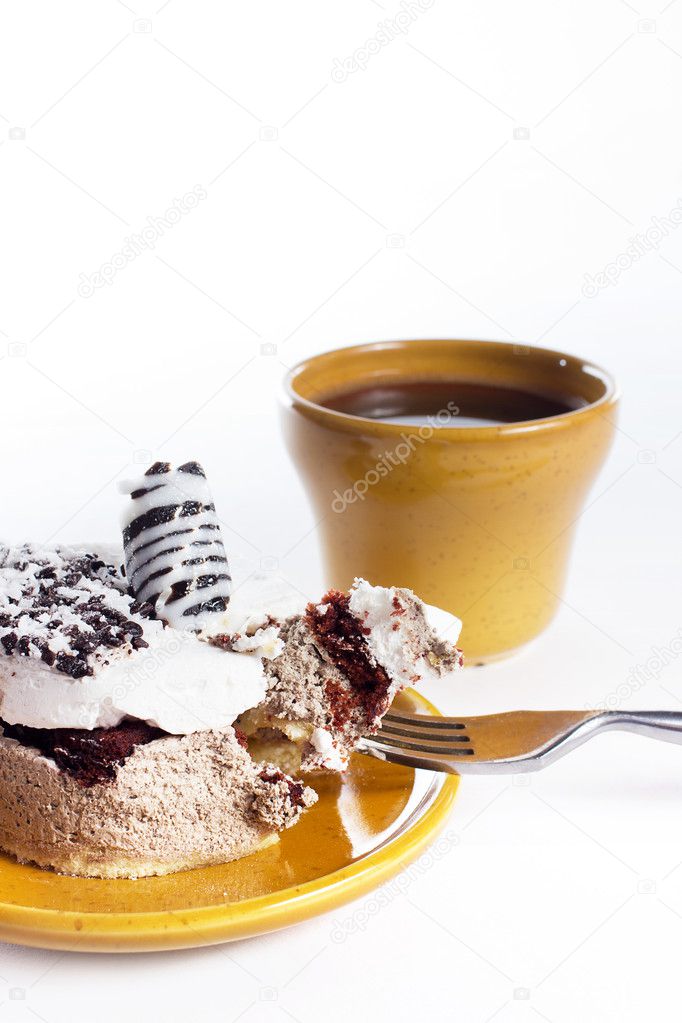Tasty dessert on the round plate with cup of coffe