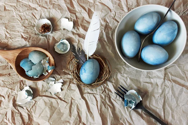 Still life with blue easter eggs with cutlery — Stock Photo, Image