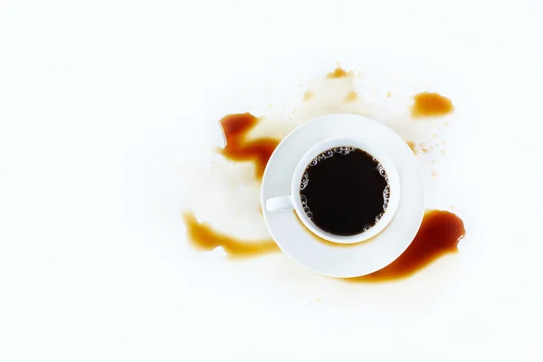 Cup of coffee on white background with stains. Breakfast. — Stock Photo, Image