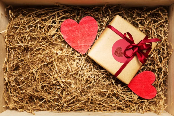 Wooden Box Present Wrapped Brown Craft Paper Red Ribbon Filled — Stock fotografie