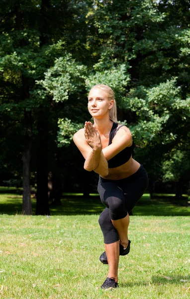 Beautiful woman doing yoga exercises — Stock Photo, Image