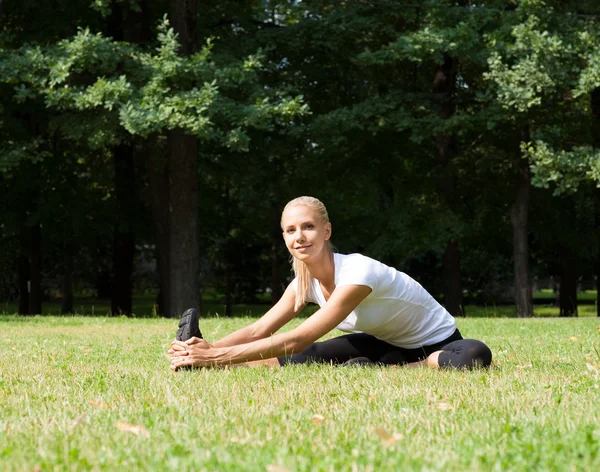 Beautiful woman doing yoga exercises — Stock Photo, Image