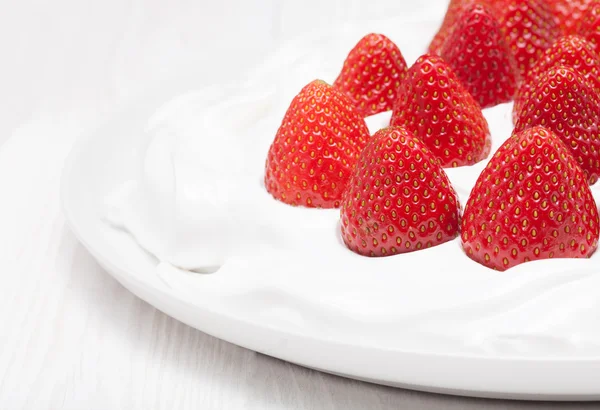 Strawberry whipped cream on a plate — Stock Photo, Image