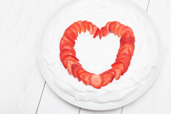 Heart from strawberry whipped cream on a plate — Stock Photo, Image