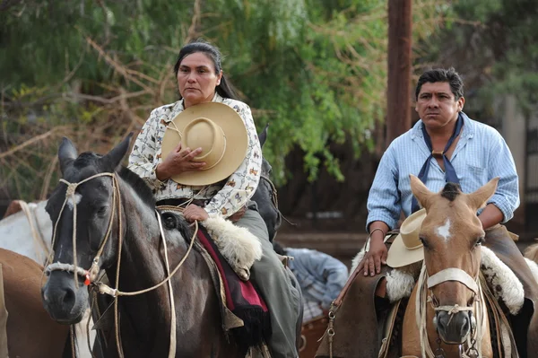 On horseback in traditional clothing — Stock Photo, Image