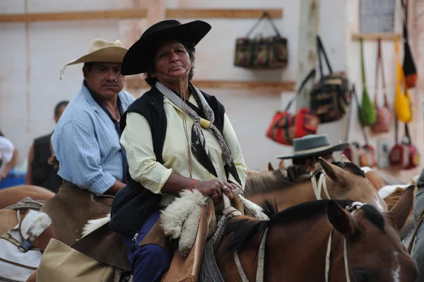 On horseback in traditional clothing — Stock Photo, Image