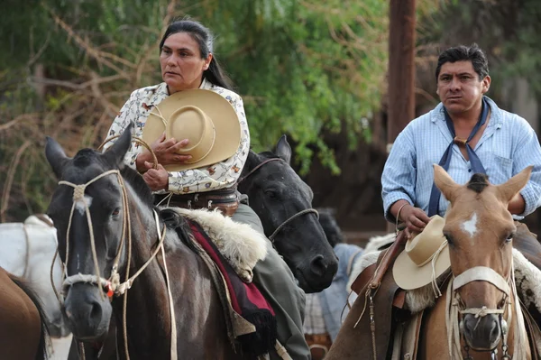 On horseback in traditional clothing — Stock Photo, Image