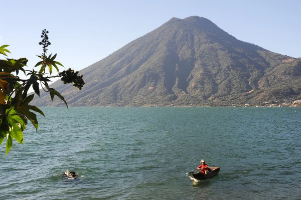 Person on canoe on lake Atitlan — Stock Photo, Image