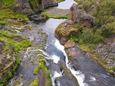 Drone view at the waterfalls of Gjain on Iceland