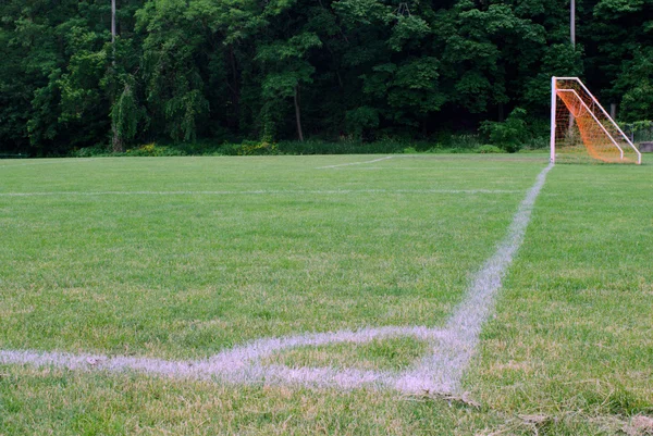 Marcas de canto no campo de futebol — Fotografia de Stock