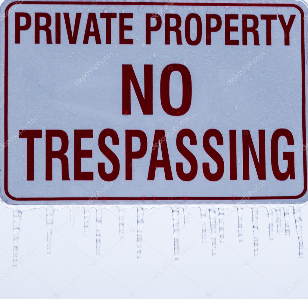 Private property sign with icicles.