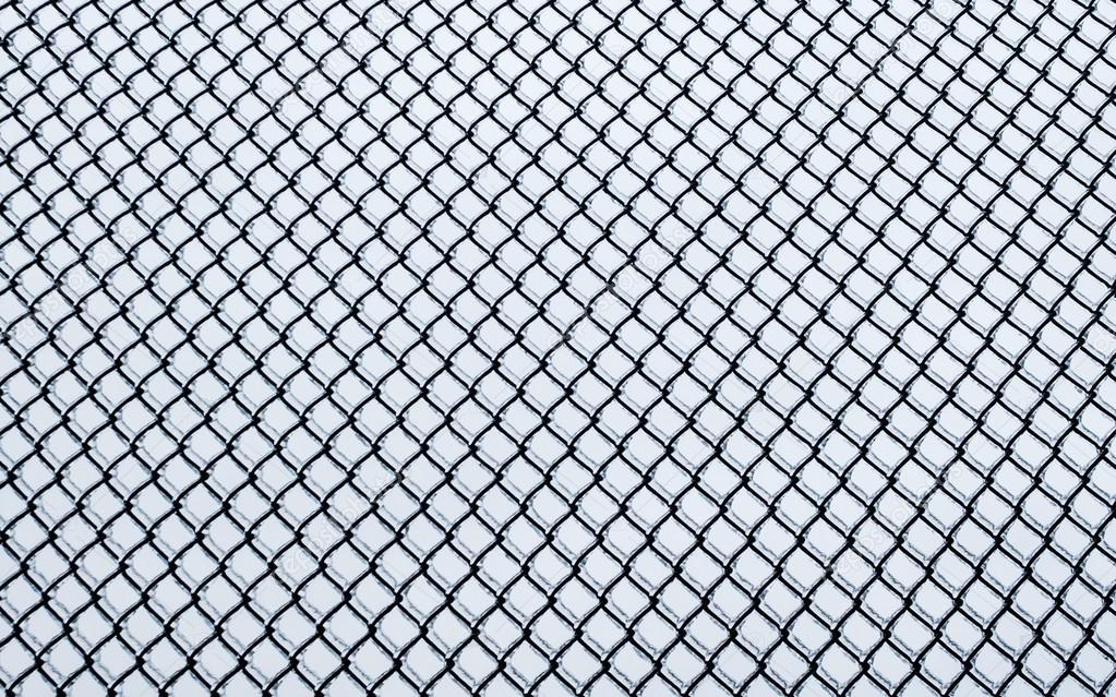 Frozen small chain-link fence pattern.