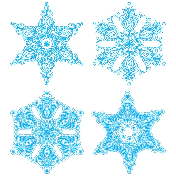 Colección de cuatro copos de nieve de elegancia — Vector de stock