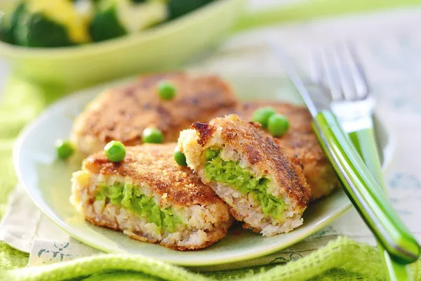 Fish croquette with green pea — Stock Photo, Image