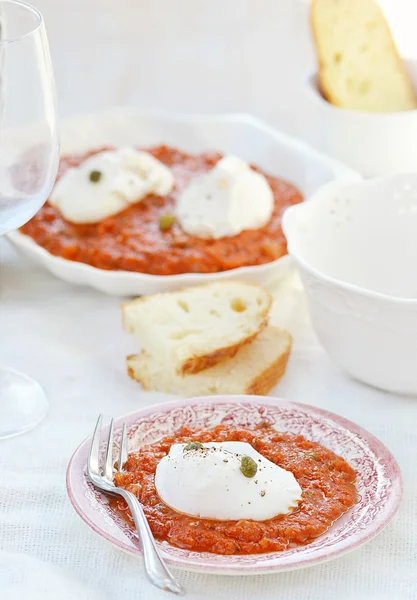 Poached egg with tomato souse — Stock Photo, Image