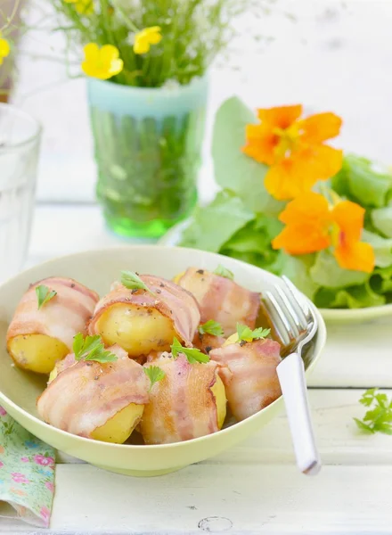 Baked potato in bacon — Stock Photo, Image