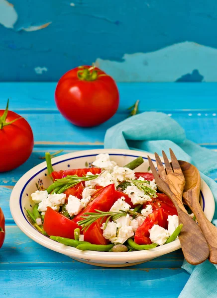Салат из зеленой фасоли и помидоров — стоковое фото