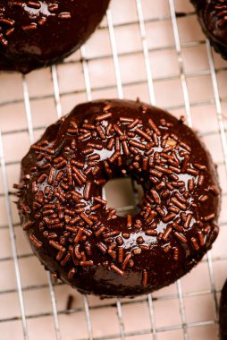 Chocolate baked donuts. top view..selective focus